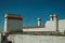 Rooftops with television antenna and chimneys