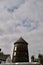 Rooftops windmill and big sky