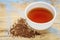 Rooibos red tea - cup and loose leaves