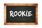 ROOKIE text written on wooden frame school blackboard