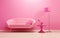 Room design in pink. Barbie color. minimalism in the interior with a pink sofa.