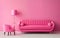 Room design in pink. Barbie color. minimalism in the interior with a pink sofa.