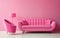 Room design in pink. Barbie color. minimalism in the interior with a pink sofa.