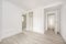 Room in empty apartment with white wood walls and carpentry