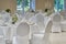 Room with festively bright tables covered in white