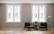 Room with light wall and wooden floor with black armchair and coffe table. Bright room interior mockup. Empty room for mockup