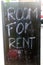 Room for rent inscription on the black board