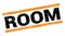 ROOM text on orange rectangle stamp sign