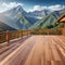 A roomy wooden deck with a stunning mountain view and great