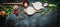 Root vegetables with wooden spoon and fresh ingredients for healthily cooking on rustic background, top view, banner.
