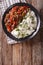 Ropa vieja: beef stew in tomato sauce with vegetables and rice g
