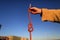 Rope access technician construction mine worker holding static 10.5 mm low stretch rope inspecting a figure of eight knot