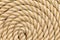 Rope background texture neatly wound into a coil