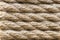 Rope background - texture. Old ropes on boat as background. Coiled rope close up