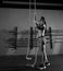 Rope Climb exercise woman workout at gym