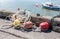 Rope with colourful buoys on a quay