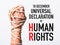 Rope on fist hand with 10 december universal declaration of HUMAN RIGHTS DAY text