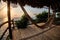 Rope hammock terrace looking at the sea on an empty island in thailand