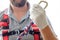 A rope in the hand of a man who is wearing equipment for working at height