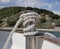 A rope made of synthetic material on a yacht against the background of the sea on a sunny summer day. Rigging on a pleasure yacht