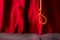 Rope noose over red background