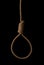 Rope noose with tight hangman knot isolated on black