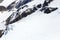 Rope team mountaineering with crampons on glacier Sexegertenferner and mountain snow panorama with blue sky in Tyrol Alps, Austria