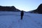 Rope team mountaineering with crampons on glacier Taschachferner towards Wildspitze and mountain snow panorama with blue sky in