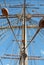 Ropes and the mast to control the sails, details of the device of the yacht, sailing ship equipment against the sky