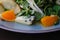 Roquefort cheese cut out with oranges and greens. Appetizer, salads. Healthy food. Restaurand and homemade food.