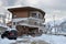 Rosa Khutor, Sochi, Russia, January, 26, 2018. Black car near cottage in the Olympic village on Rosa Khutor resort in the morning