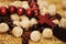 Rosary beads, coffee beans, brown food, decor