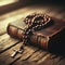 Rosary beads lay poignantly across a leather bound book of faith, on old wooden surface