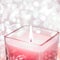 Rose aromatic candle on Christmas and New Years glitter background, Valentines Day luxury home decor and holiday season brand