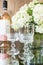 Rose blush wine in glasses. Bottle of rose wine with flowers on background. Prosecco