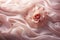 Rose flower on a waved draped soft pink silk fabric. Texture horizontal copy space background