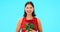 Rose flowers, face and happy woman in studio, blue background and color backdrop. Portrait of female model, plant