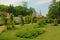 Rose garden of the Abbey of Chaalis whit chapel behind