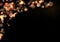Rose and gold Christmas or new year bokeh lights on a black background