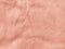 Rose gold color velvet fabric texture top view. Female blog pink velour background. Smooth soft velvety cloth metallic