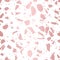 Rose gold terrazzo seamless pattern. Trendy vector pink metallic foil texture