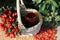 Rose hips and rose hip marmalade in a basket