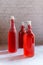 Rose Kombucha in glass bottle, healthy beverage fermented tea drink