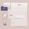 Rose logo. Cosmetics brand corporate identity. Business cards, letterhead, envelope and mock up branded product.