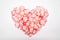 Rose Petals in the Shape of Heart on White Background. Concept International Woman Day 8 March, Valentine`s Day