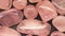 Rose quartz jewel heap texture. Pile mineral pebbles background. Moving right seamless loop backdrop