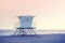 Rose quartz and serenity color toned picture of a lifeguard tower.