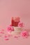 Rose soap. Beauty and aromatherapy. Flower soap. Pink soap bars and pink roses on pink background.Rose Soap with Rose