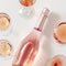 Rose wine assortment in crystal glasses, bottle of rose champagne sparkling wine. Summer alcoholic drink