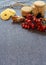 Rosehip berries, jars of buckwheat honey, cinnamon, dried pineapples